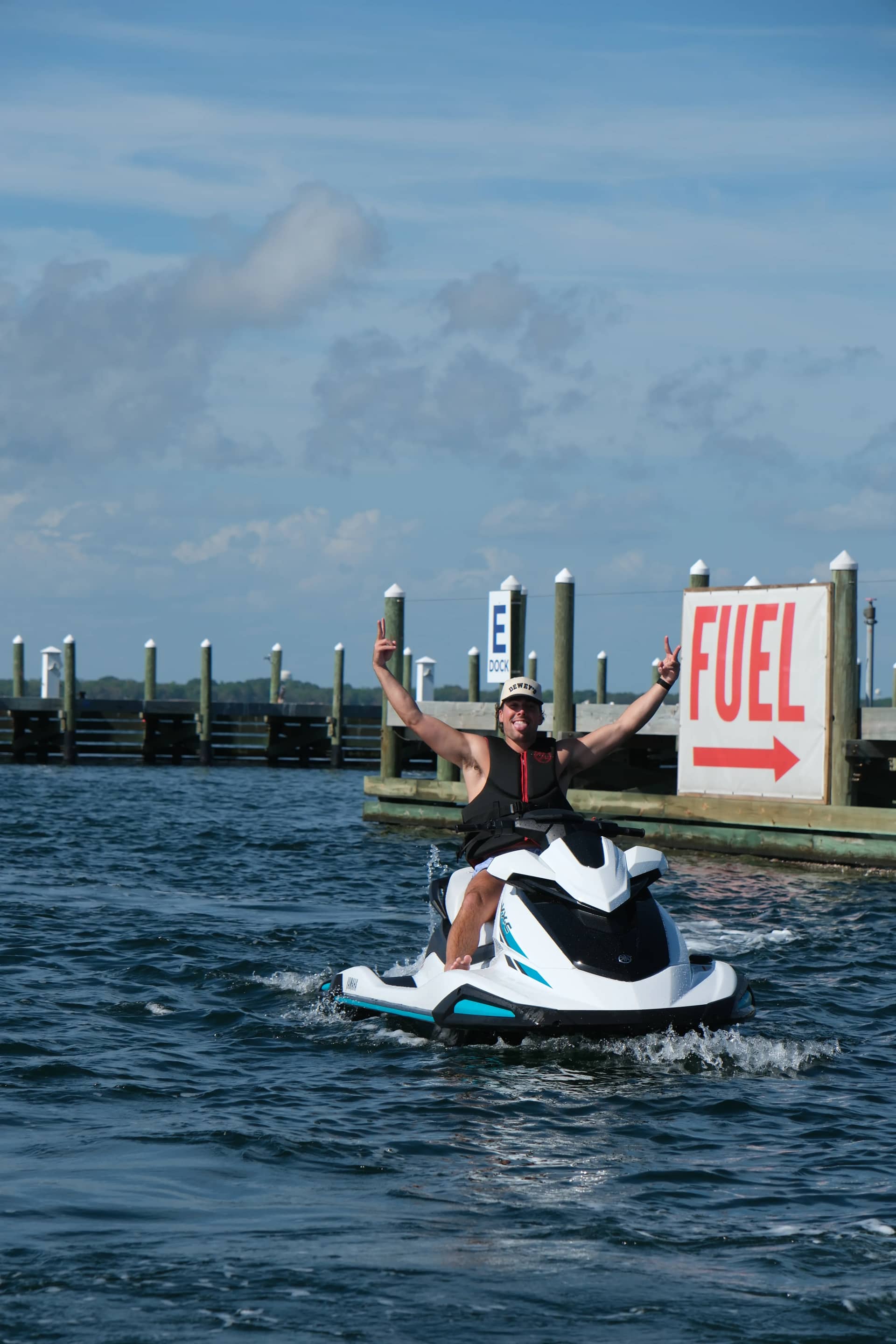 Jet ski wake on clear emerald water off Okaloosa Island